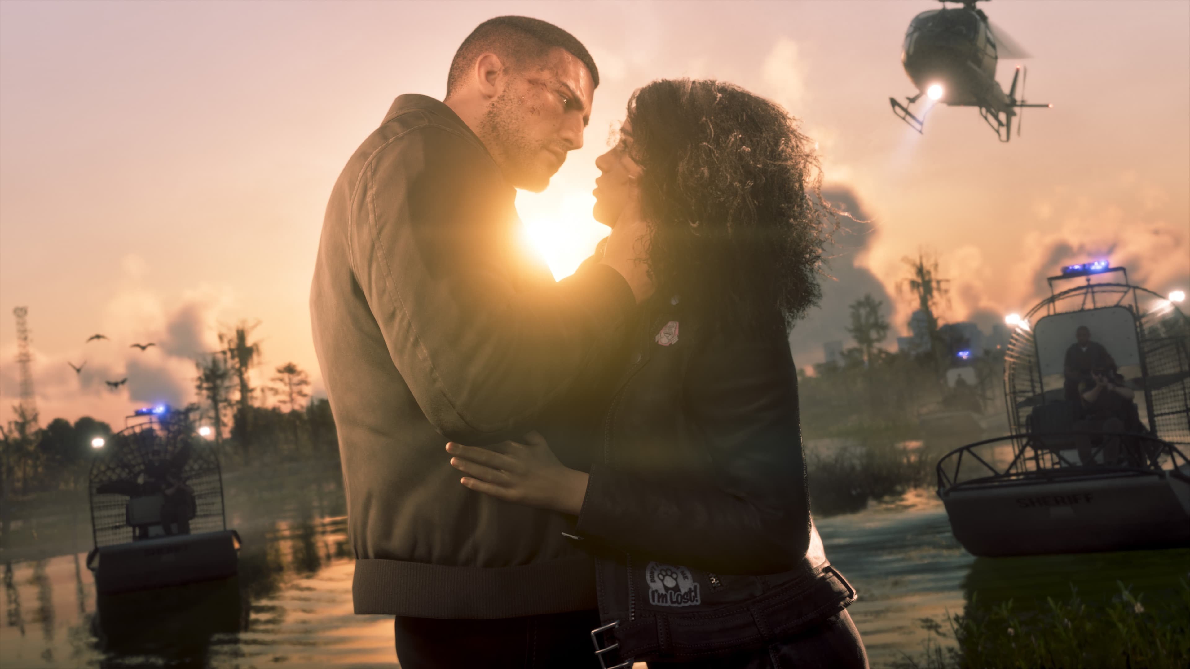 Jason e Lucia abraçados ao pôr do sol, com helicópteros ao fundo, em captura de tela oficial de GTA VI usada como ilustração — a imagem não tem relação com o Daft Punk